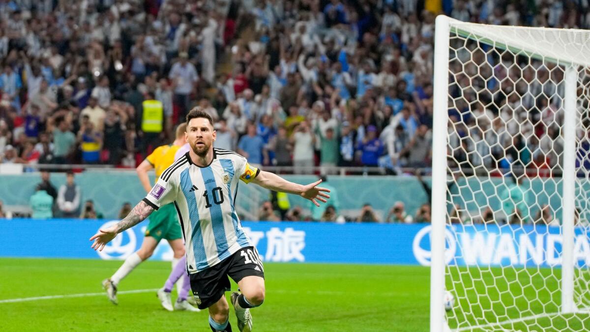 Argentina's Lionel Messi celebrates scoring the opening goal during the World Cup round of 16 match against Australia. - AP
