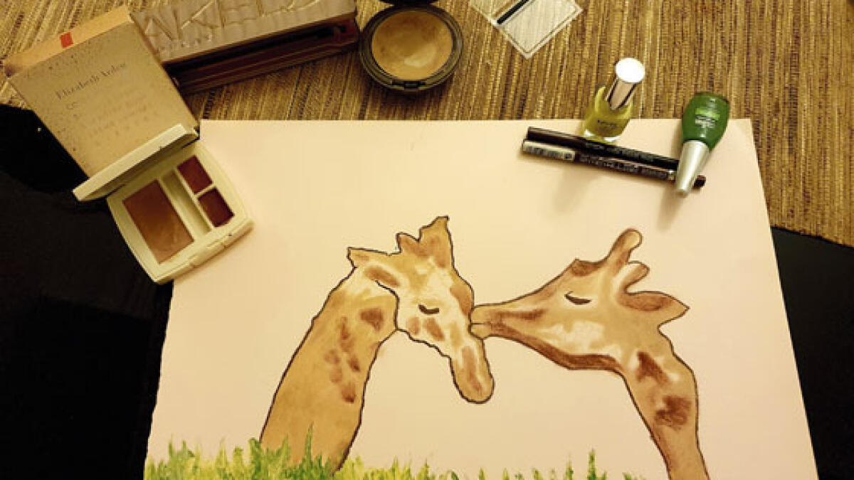 Kavita Sriram: “I used foundation for the base, eye shadow and lipstick for the shading (of the giraffes), kohl pencils to further outline it, and nail polish for the grass and dragon flies”