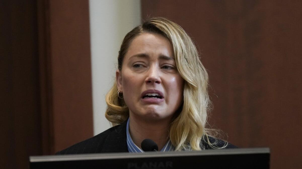 Actor Amber Heard testifies about the first time her ex-husband, actor Johnny Depp hit her. Photo: AFP
