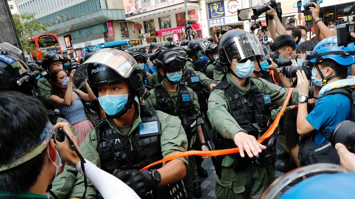 Hong Kong, police, 30, protests election Lam