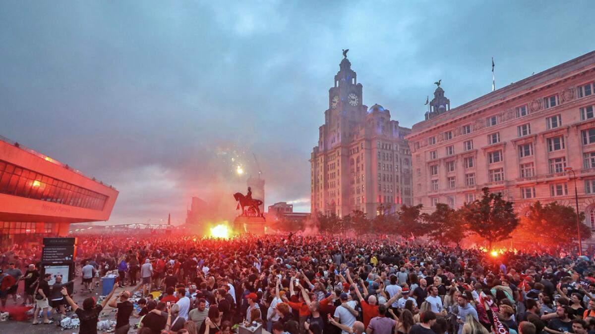 ans are being urged to celebrate the clubs Premier League triumph at home as police believe more gatherings are planned after thousands filled the streets outside Anfield. Photo: Peter Byrne/PA Wire/AP(Research done by Fakhar Ul Islam/Khaleej Times)