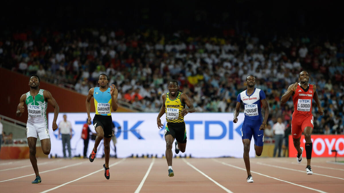 Jamaica's Rusheen McDonald, middle, competes in a men?s 400m semifinal at the World Athletics Championships at the Bird's Nest stadium in Beijing, Monday, Aug. 24, 2015. 