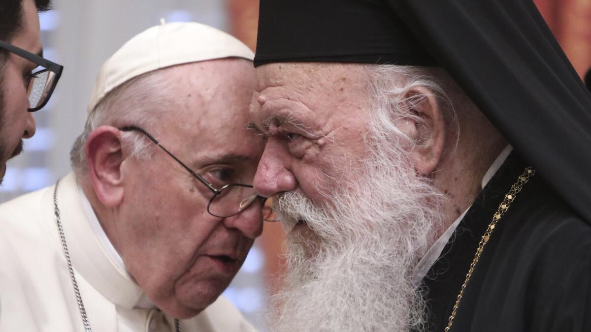 Pope Francis meets Archbishop of Athens and leader of Greece's Orthodox Church Ieronymos II at the Orthodox archbishopric in Athens, Greece. — AP file