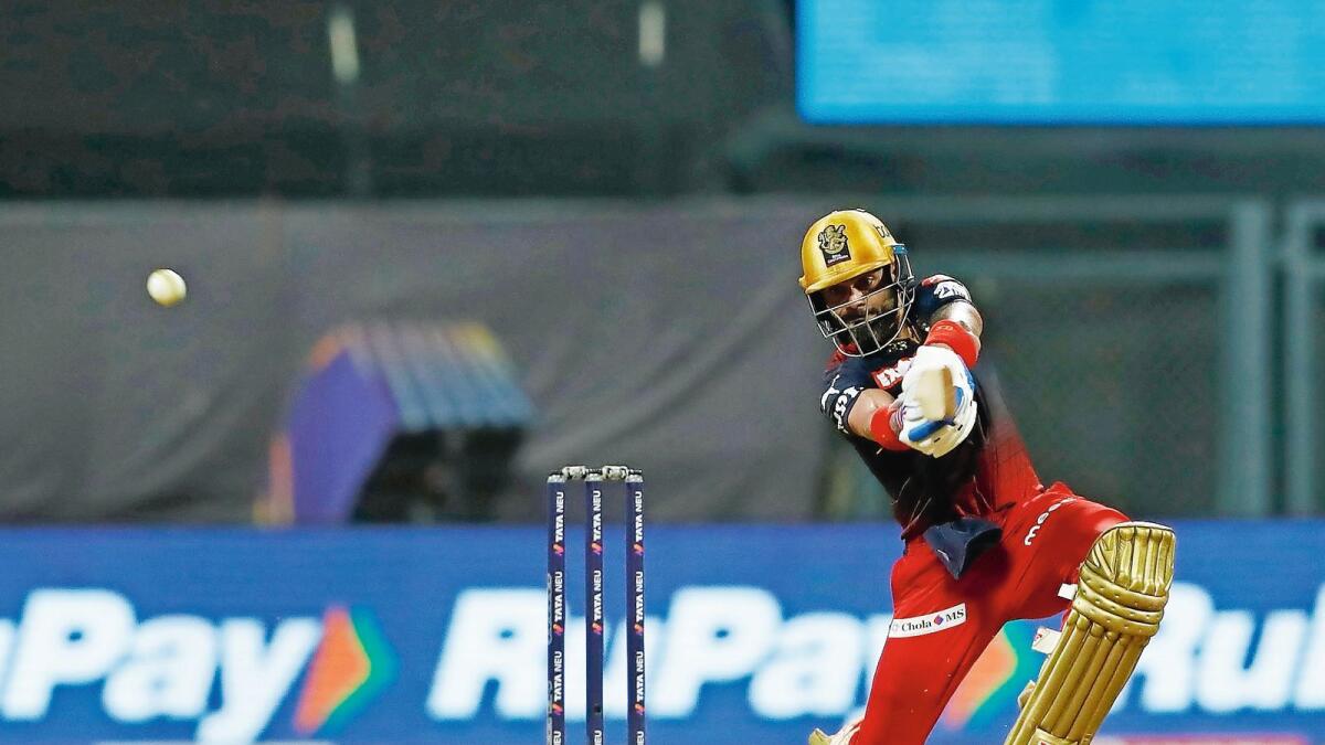 Virat Kohli of Royal Challengers Bangalore plays a shot against Gujarat Titans in Mumbai on Thursday night. — BCCI
