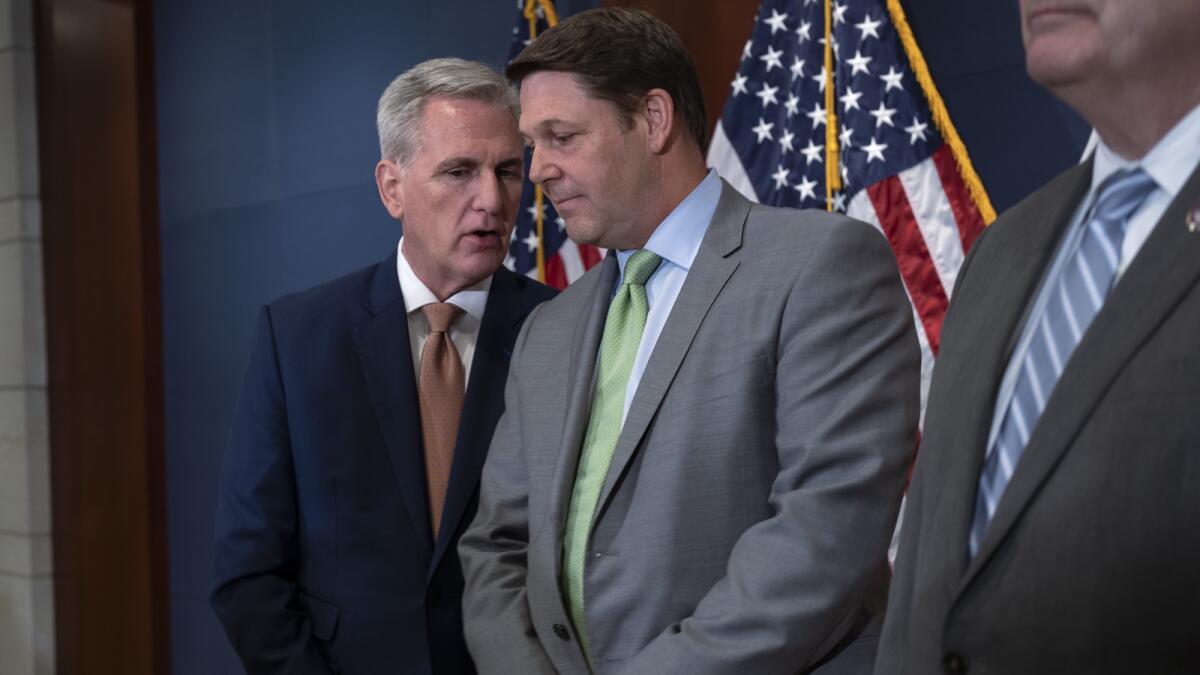 Speaker of the House Kevin McCarthy, a Republican from California, left, confers with House Budget Committee Chairman Jodey Arrington, a Republican from Texas, as Republican leaders meet with reporters following a closed-door briefing on the budget that will be submitted by President Joe Biden, at the Capitol in Washington, Wednesday. - AP