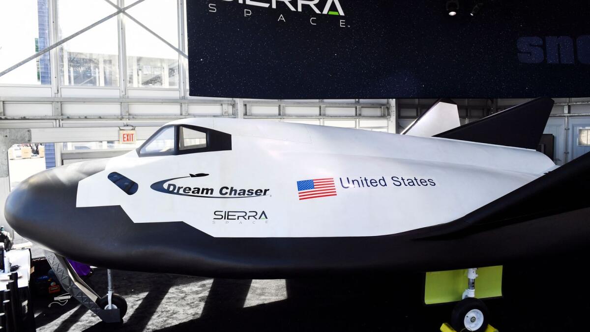 A full sized crew model of the Sierra Space Dream Chaser space plane is displayed ahead of the Consumer Electronics Show (CES) in Las Vegas, Nevada on January 4, 2022. -- AFP