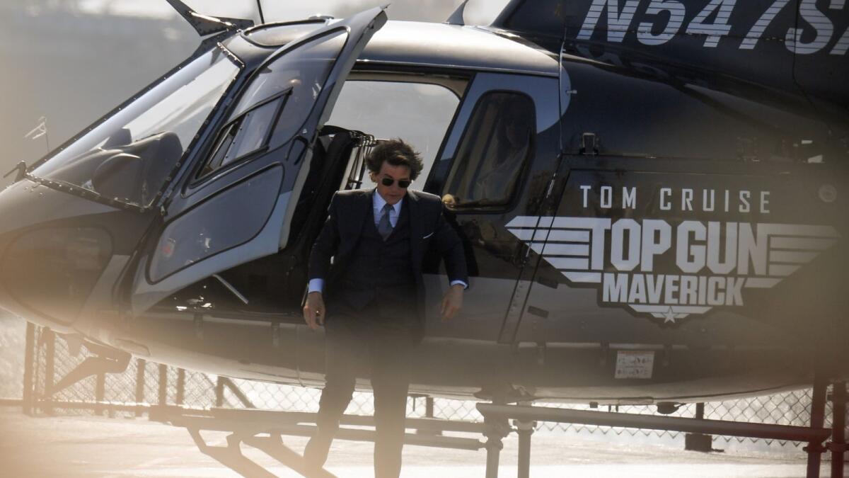 US actor Tom Cruise arrives in a helicopter to the world premiere of 'Top Gun: Maverick!'. Photo: AFP