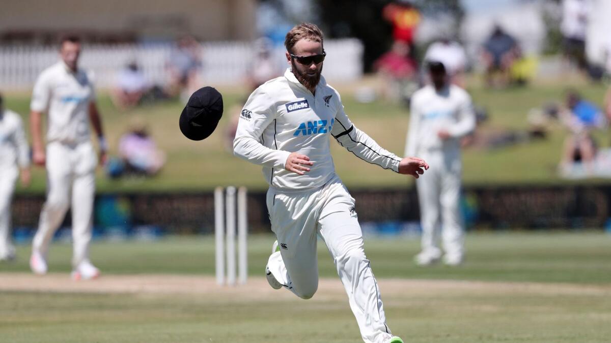 Kane Williamson runs after the ball while fielding during the fifth day of the first Test against Pakistan. — AFP