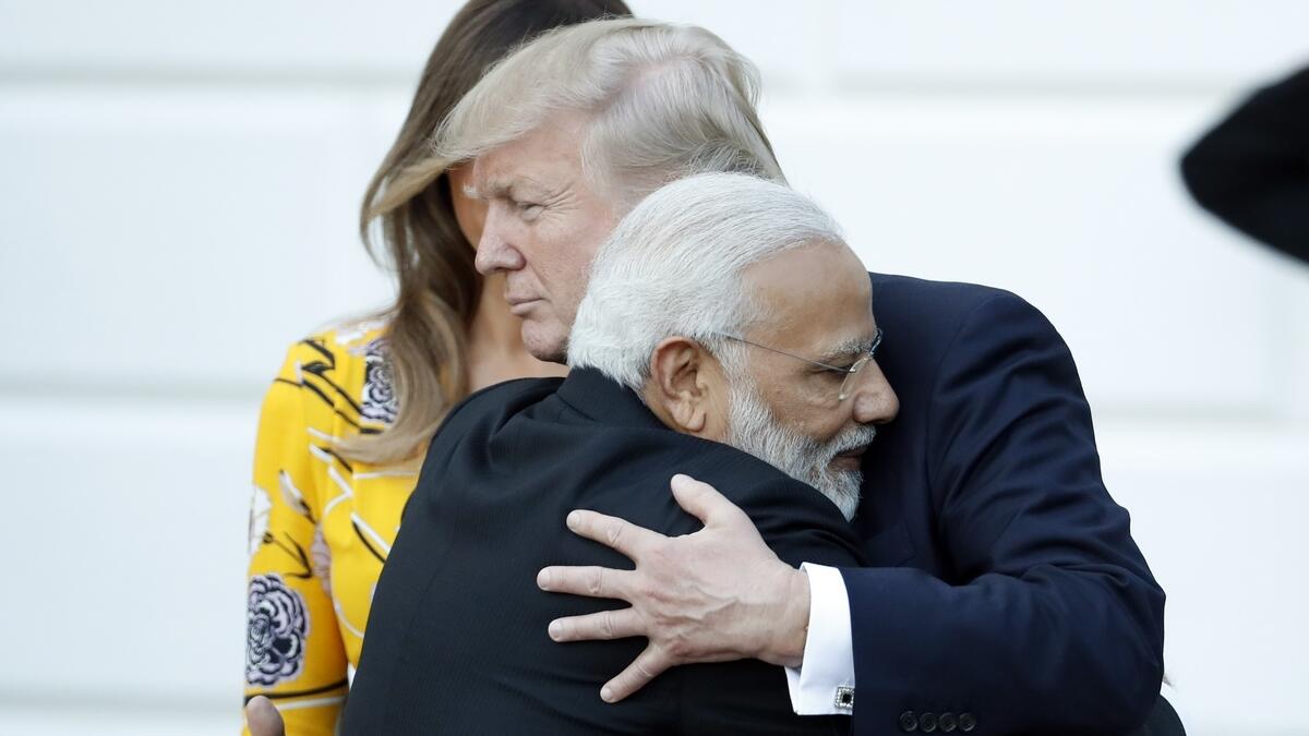 Indian Prime Minister Narendra Modi hugs President Donald Trump as Modi departs the White House, Monday, June 26, 2017, in Washington.