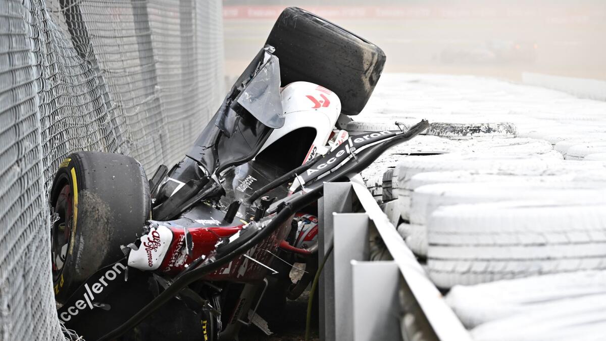 Alfa Romeo Chinese driver Zhou Guanyu is seen in the crash barriers. Photo: AFP
