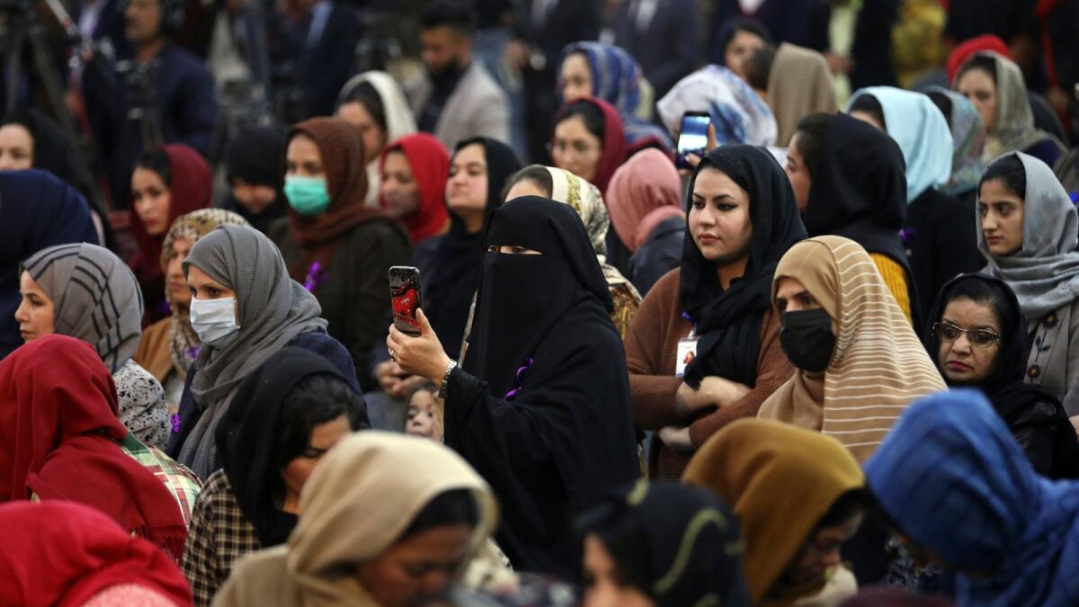 Afghan women attends an event to mark International Women's Day in Kabul on March 7, 2021.