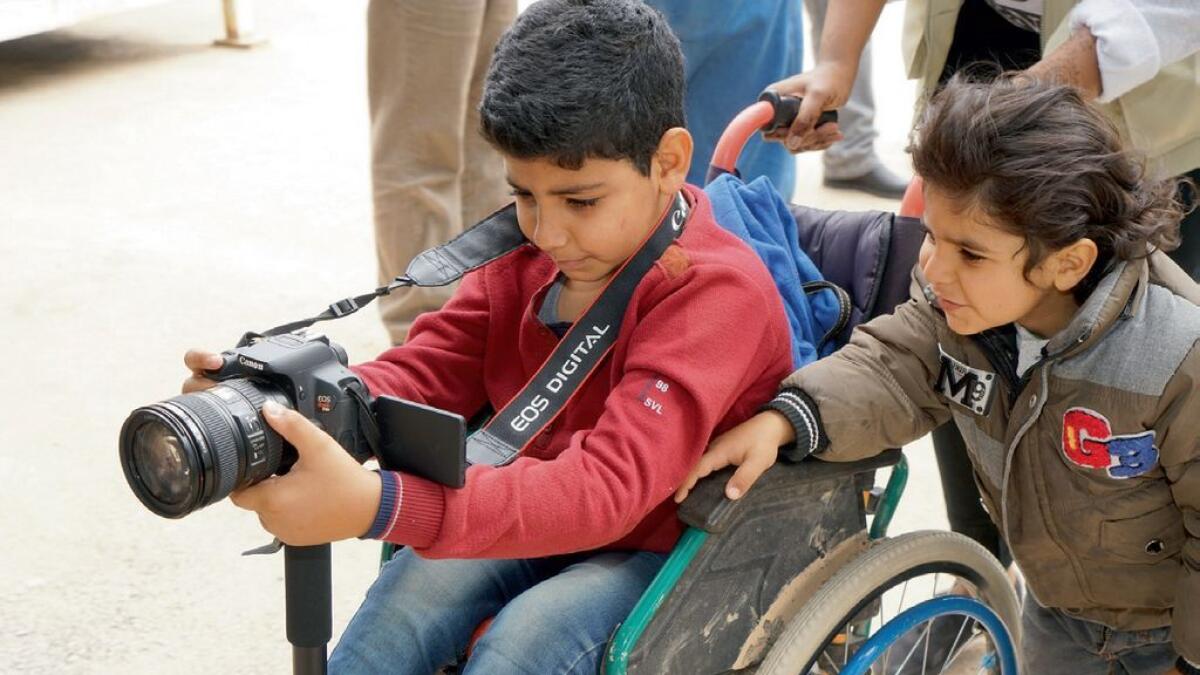 Refugee kids experience FUNN magic of movies, photography