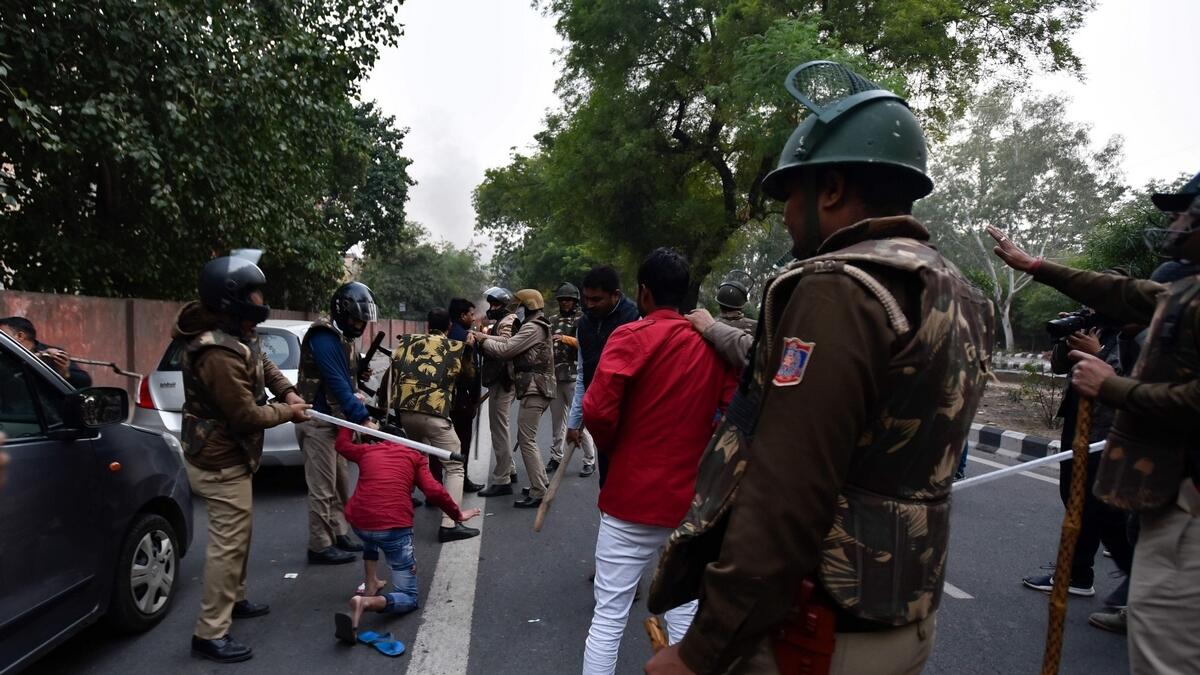 Police clash with demonstrators following a protest against the Indian government's Citizenship Amendment Bill (CAB) in New Delhi on December 15, 2019. AFP