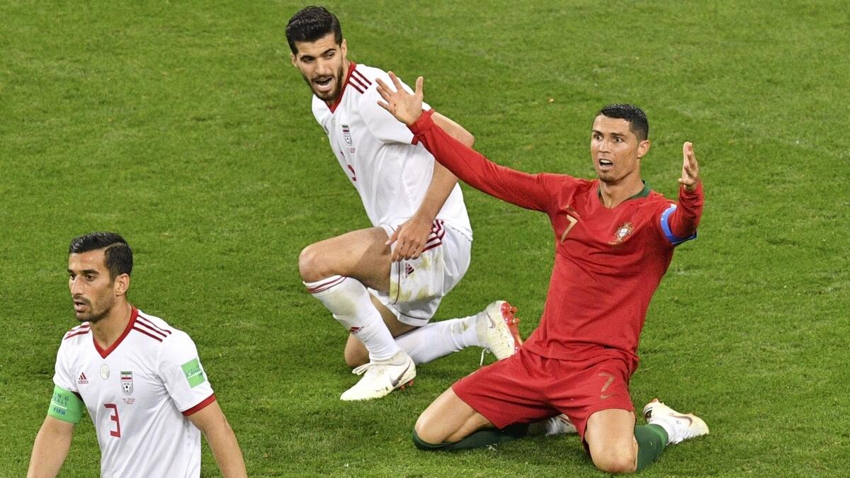 Spain, Portugal qualify after dramatic games as Ronaldo misses penalty