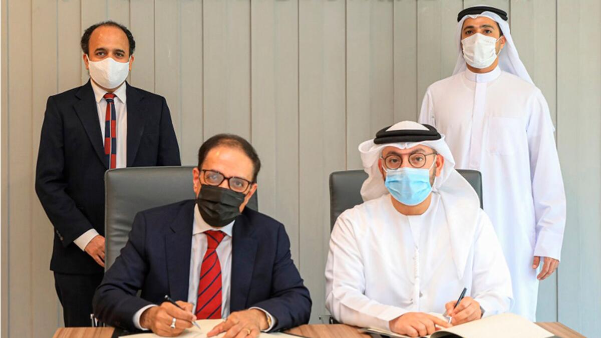 The signing ceremony was attended by Abdulla Belhoul, Saud Abu Al Shawareb, Shailendra Malhotra and Jatin Brahmecha.
