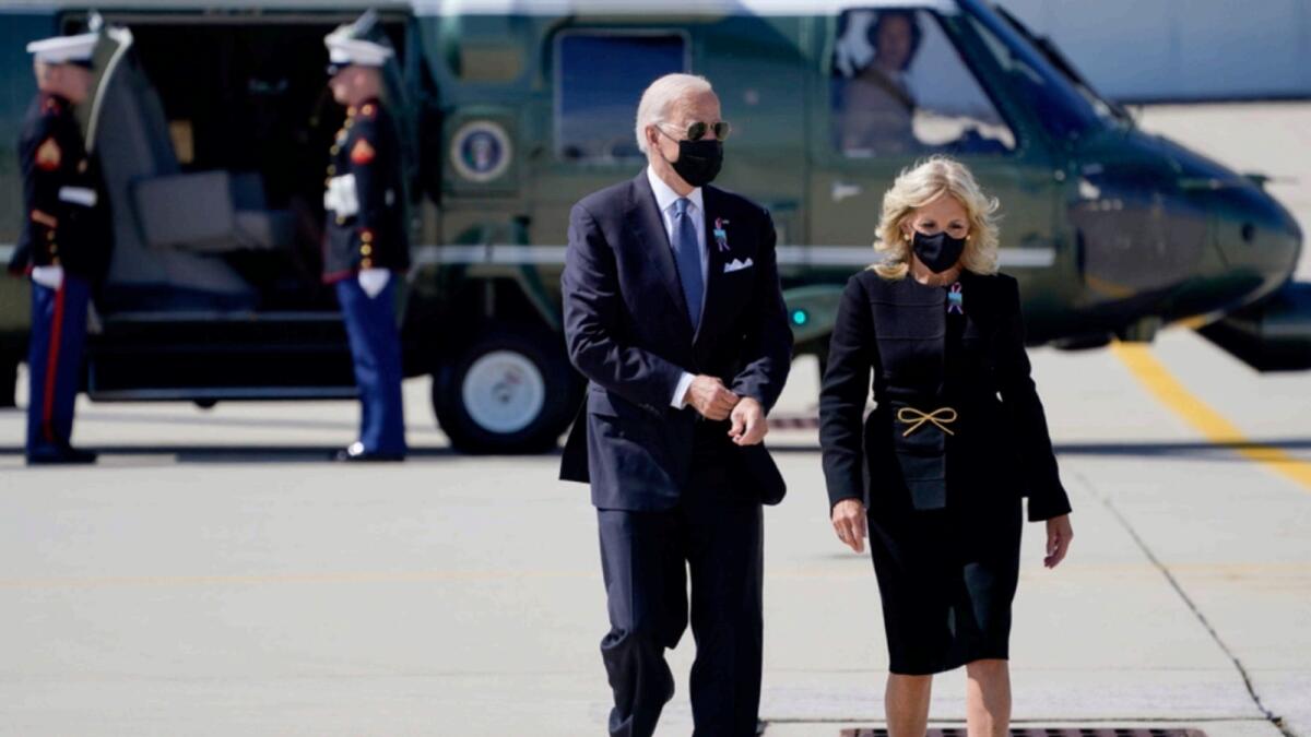 President Joe Biden and first lady Jill Biden walk to board Air Force One at Pennsylvania Army Air National Guard Base in Johnstown. — AP