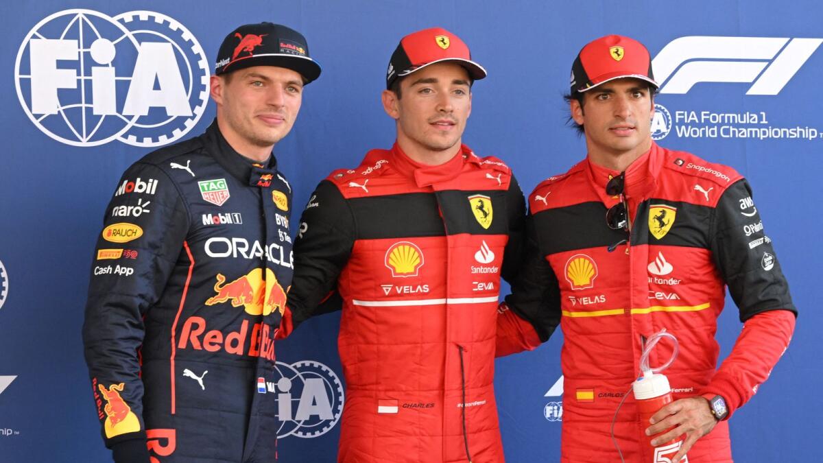 Ferrari's Charles Leclerc (centre), Red Bull's Max Verstappen (left) and Ferrari's Carlos Sainz after qualifying. — AFP