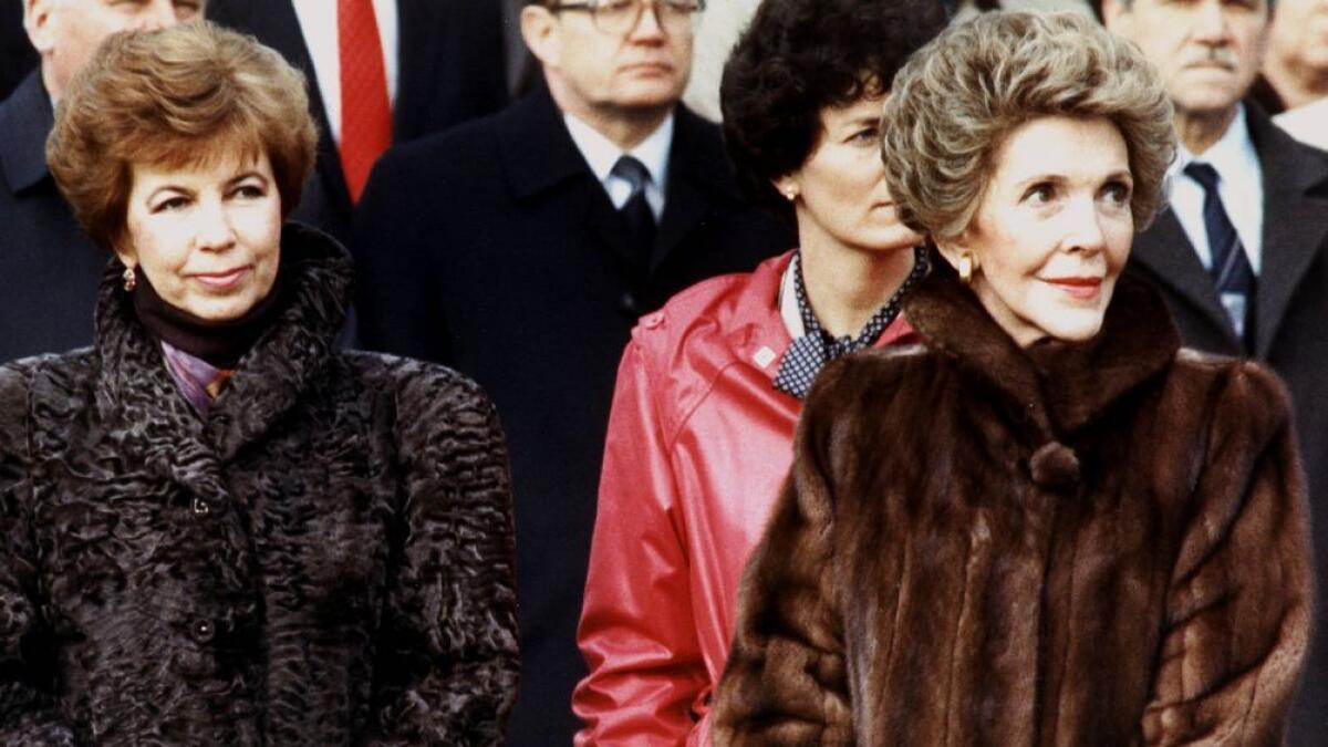 Raisa Gorbachev (L) wife of Soviet leader Mikhail Gorbachev, accompanied by US First Lady Nancy Reagan (R) attend a welcoming ceremonies for Gorbachev at the White House in Washington, DC.- AFP file photo
