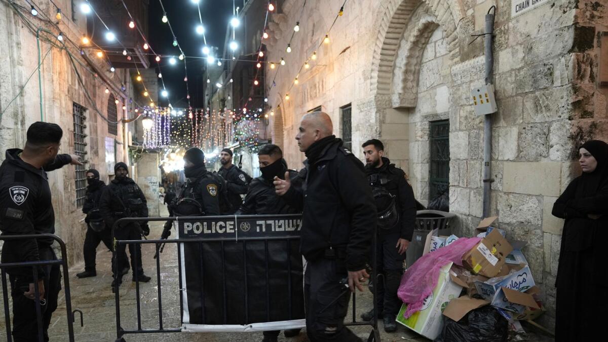 Israeli police close a path leading to the Al-Aqsa Mosque compound after shots were fired in the Old City of Jerusalem during the holy month of Ramadan, on Saturday.