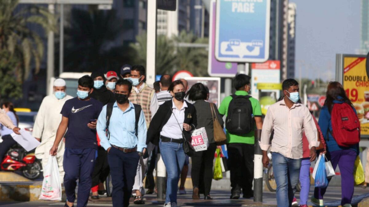 Health experts maintain that people must continue to take precautionary measures like wearing masks and using hand sanitisers. — File photo