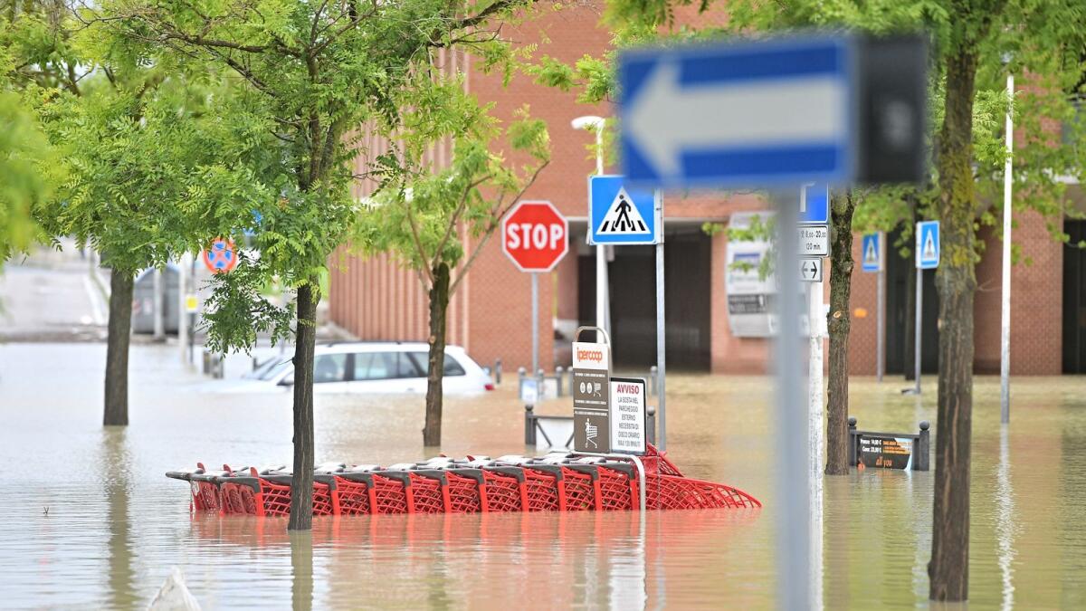 A picture taken in Cesena on May 17, 2023 shows a flooded street after heavy rains have caused major floodings in central Italy. AFP
