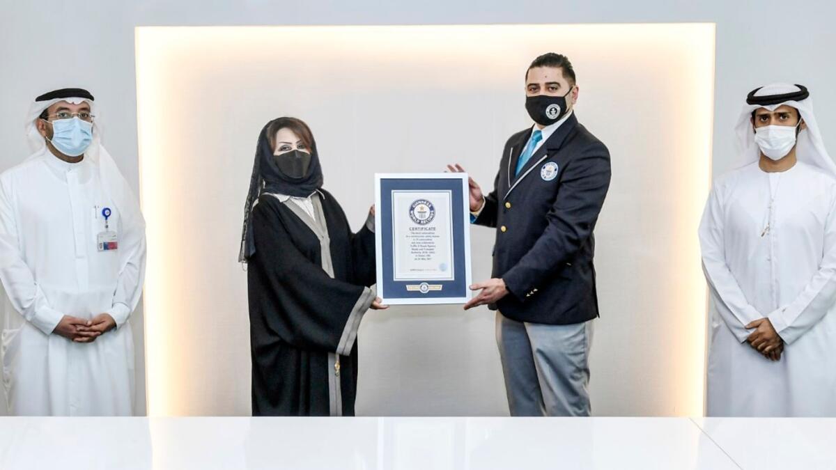 RTA official receives Guinness World Record certificate. — Wam