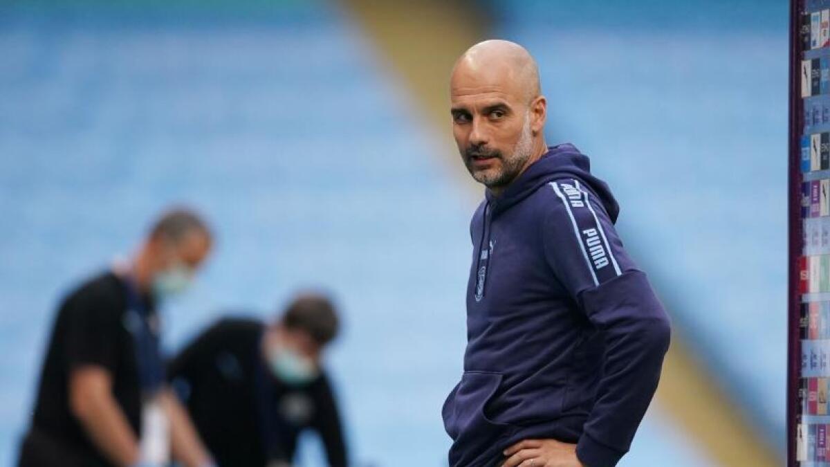 Manchester City manager Pep Guardiola reminded his players that they were 15 points behind champions Liverpool having played one match less. (Reuters)