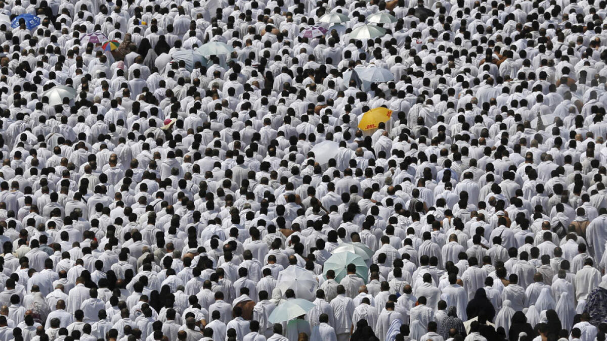 Pilgrims perform prayers in Arafat during the Haj pilgrimage.