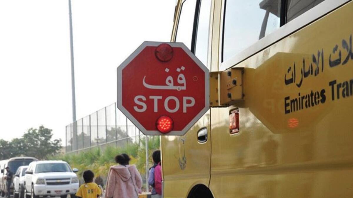 Speeding motorist, Abu Dhabi, school bus stop sign
