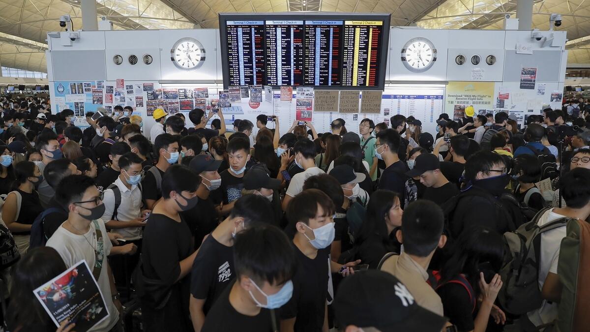Hong Kong protests ground flights as Chinas ire mounts