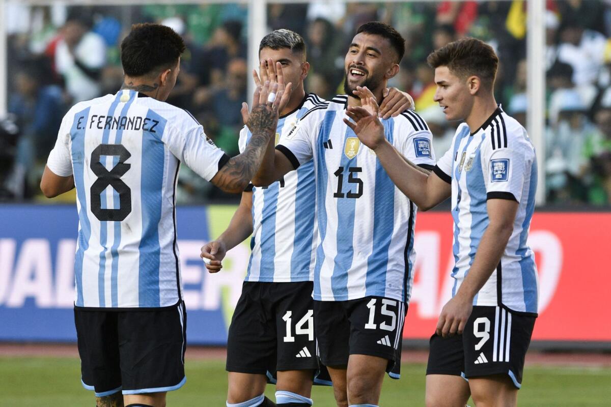 Argentina forward Nicolas Gonzalez (centre) celebrates with teammates after scoring a goal. — AFP