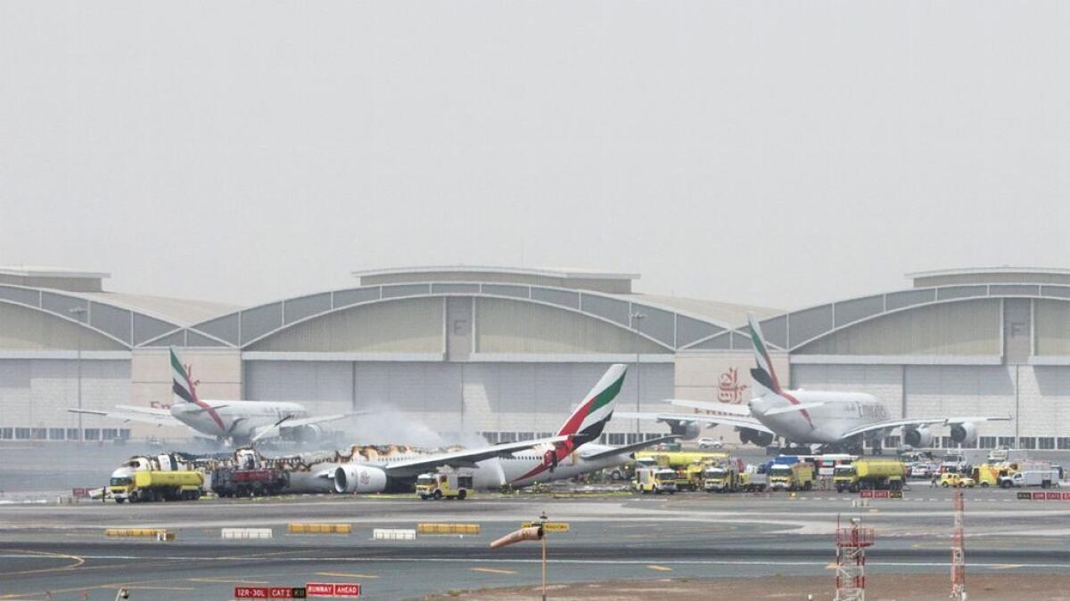 The Emirates Airline flight is seen after its emergency landing at Dubai International Airport. 