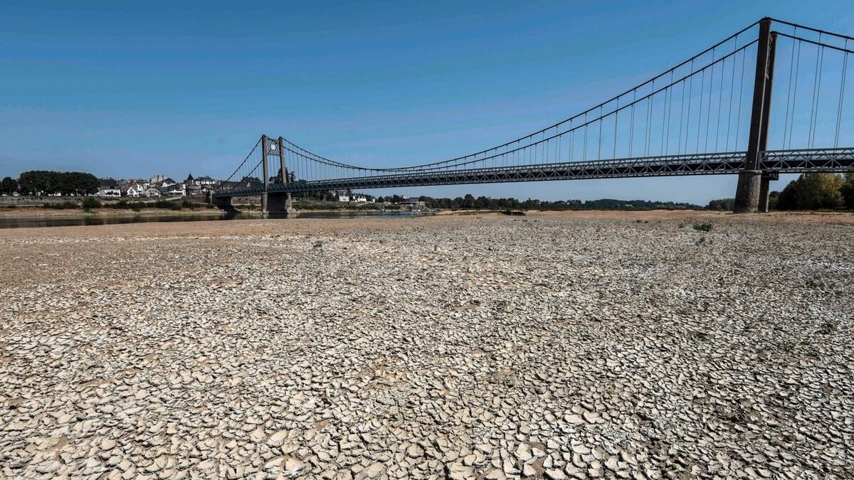 A view of a section of the dried-out Loire river bed is pictured at Ancenis, western France as drought like conditions prevail over much of western France. Photo: AFP