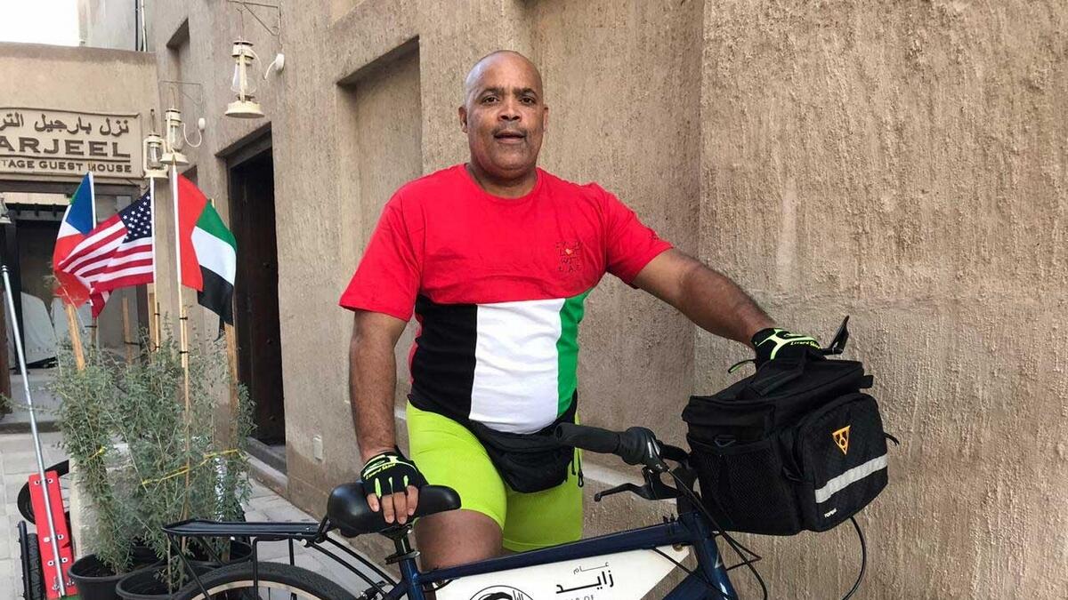 Donning the UAE’s Pan-Arab colors of red, green, white and black, visiting New Yorker Don Victor Mooney has embarked on a 300km bike ride from Dubai to Al Ain.-Supplied photo