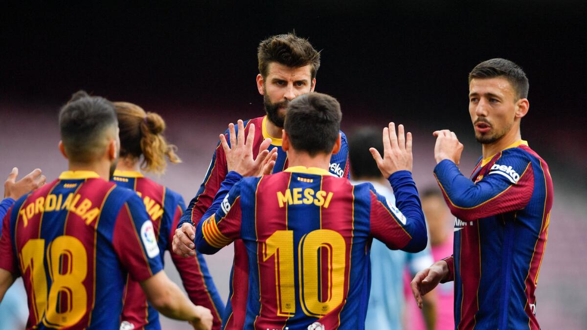 Barcelona players celebrate a goal. (AFP file)