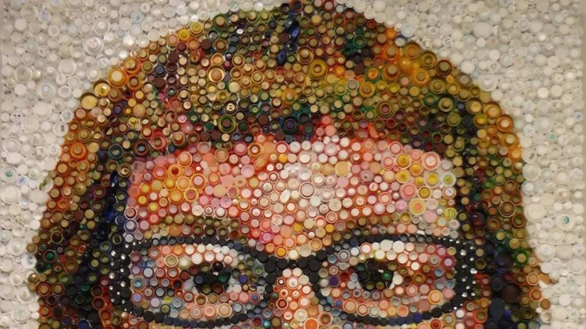 A portrait by the late artist, Mary Ellen Croteau, created with bottle caps.