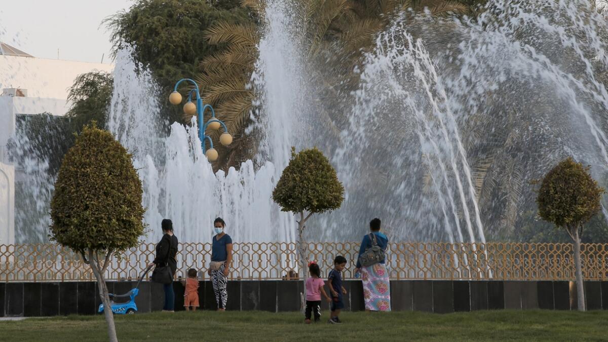 Residents enjoy the view of water fountain at Al Khalidiya Park in Abu Dhabi. Photo by Ryan Lim/Khaleej Times