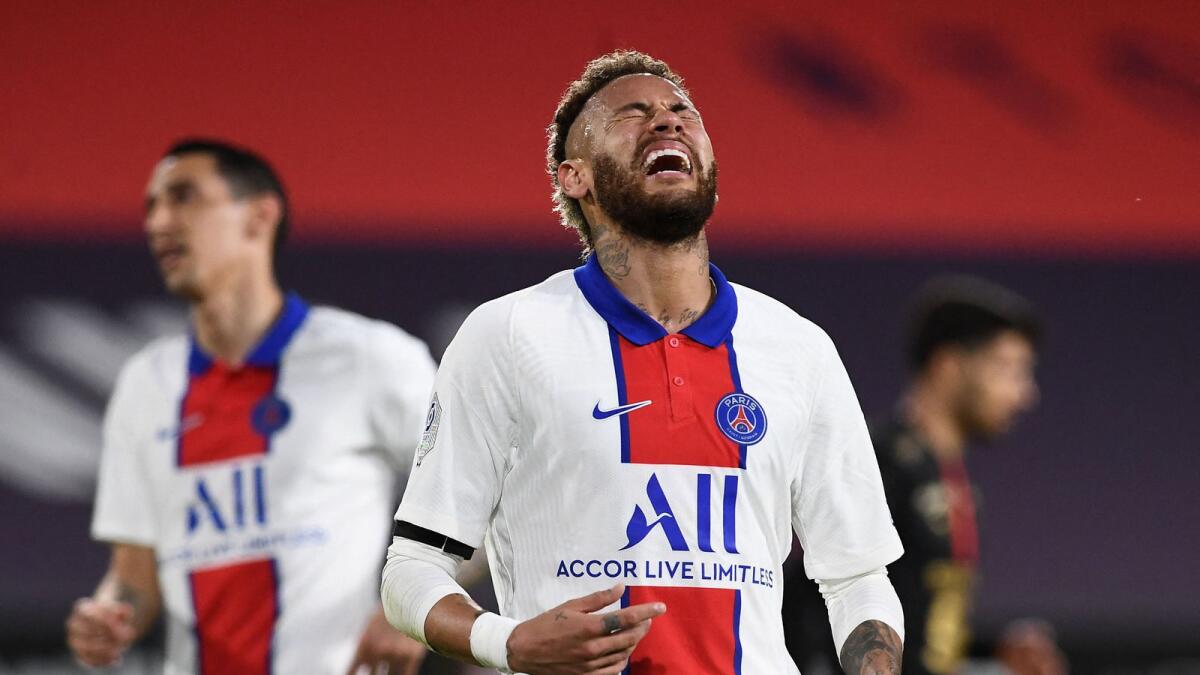 Paris Saint-Germain's Brazilian forward Neymar reacts after missing an opportunity during the French L1 match against Stade Rennais. — AFP