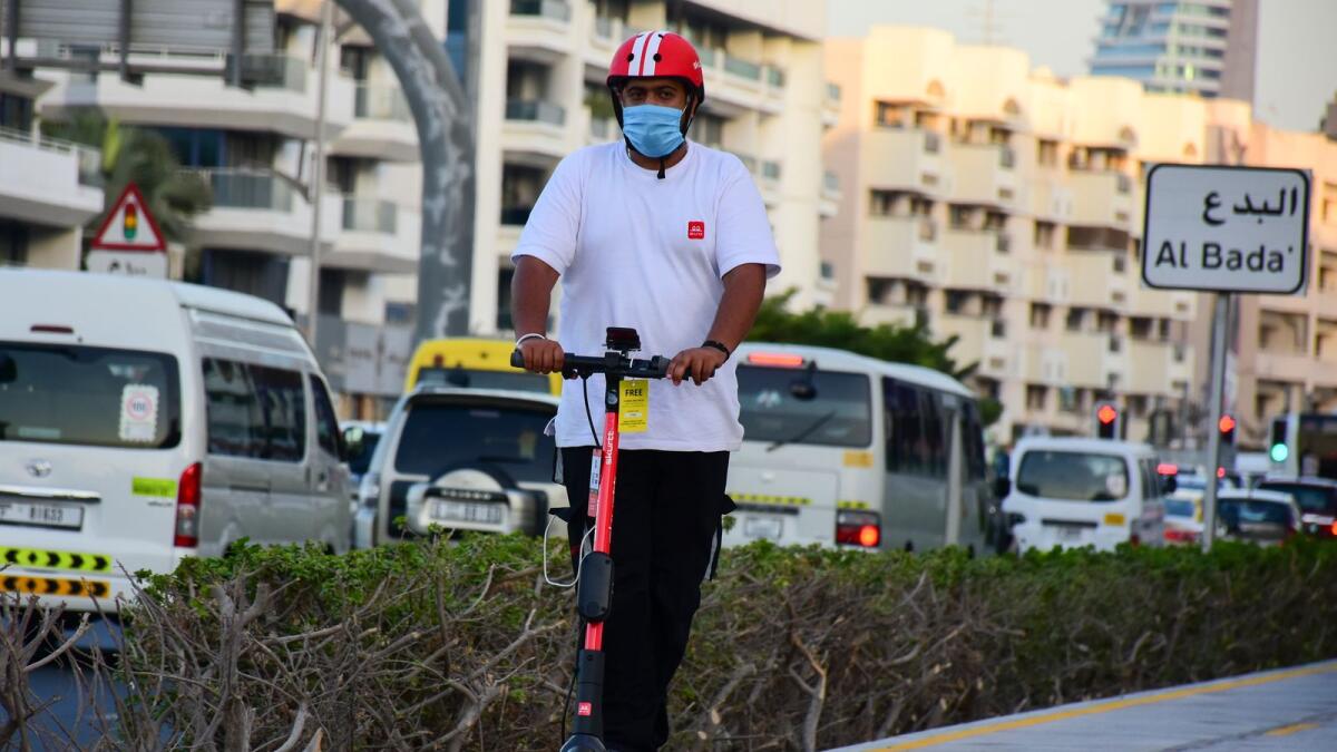 A resident uses E scooter in Satwa, Dubai. Photo: File