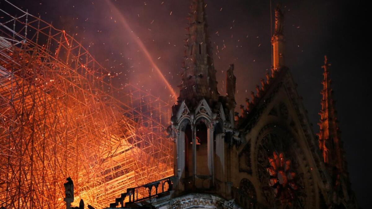 Notre-Dame Cathedral devastated by fire; Macron pledges to rebuild