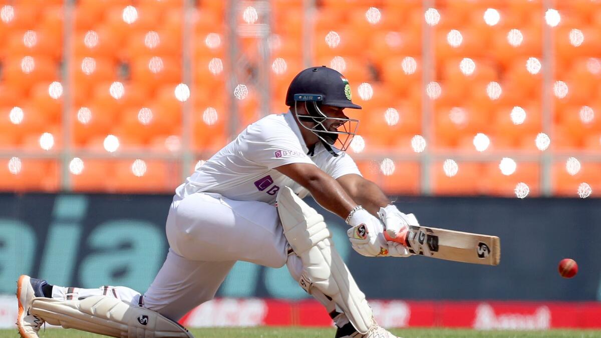 Rishabh Pant took the breath away with a reverse sweep against James Anderson for a boundary before reaching the hundred with a six over the square leg boundary off Joe Root. (AP)