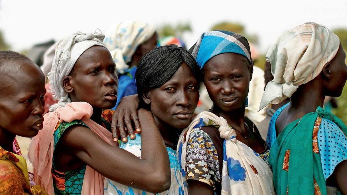 Women wait in line during a UNICEF supported mobile health clinic in Rubkuai village, Unity State, South Sudan. 