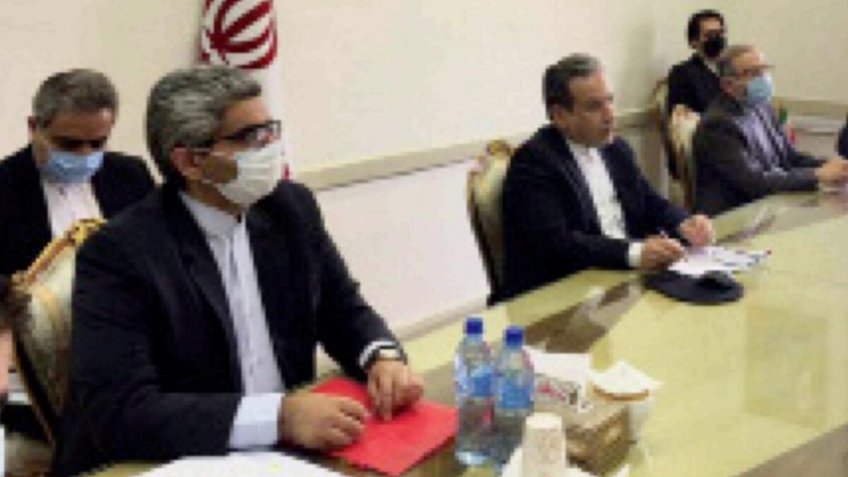 Iran' deputy Foreign Abbas Araghchi (C) attends a virtual meeting with the Joint Commission on Iran's nuclear program (JCPOA) in Tehran. — AFP