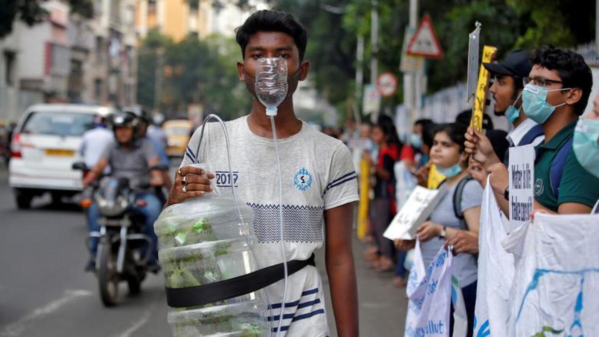 An activist takes part in a global climate strike in Kolkata, India, September 20, 2019. Ruters