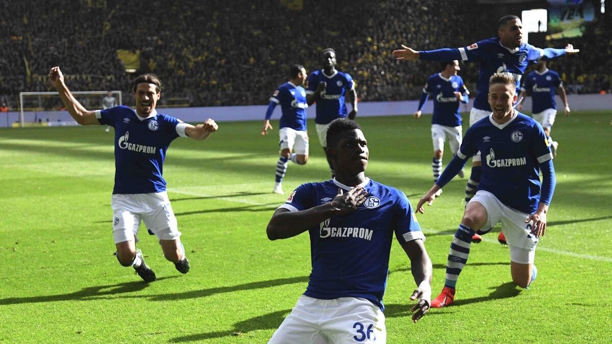 Dortmunds title hopes dented by shock home loss to Schalke