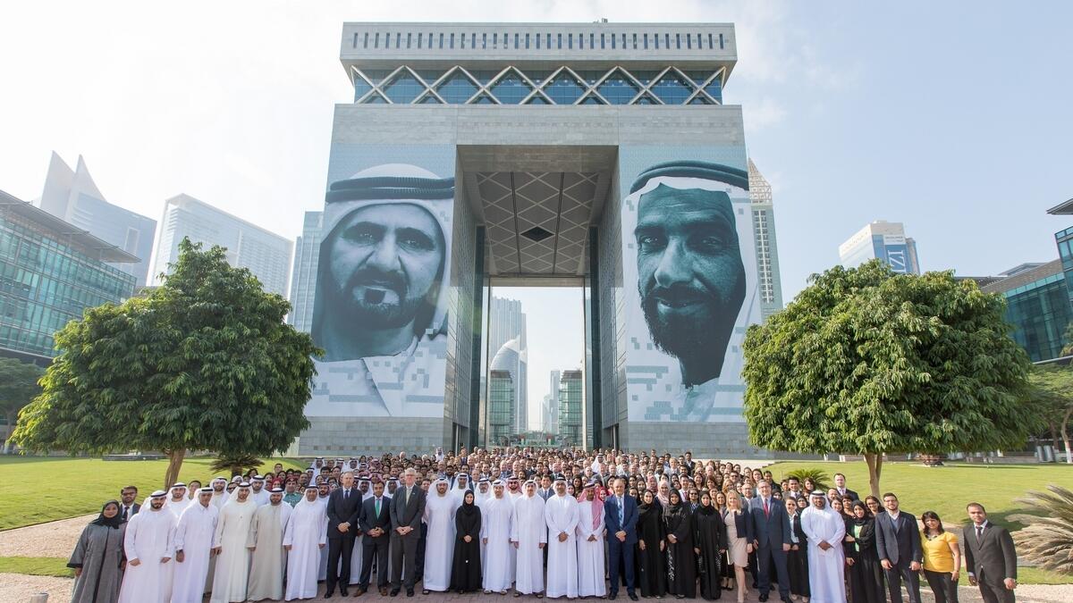 Officials and staff of the Dubai International Financial Centre celebrating the UAE's National Day.