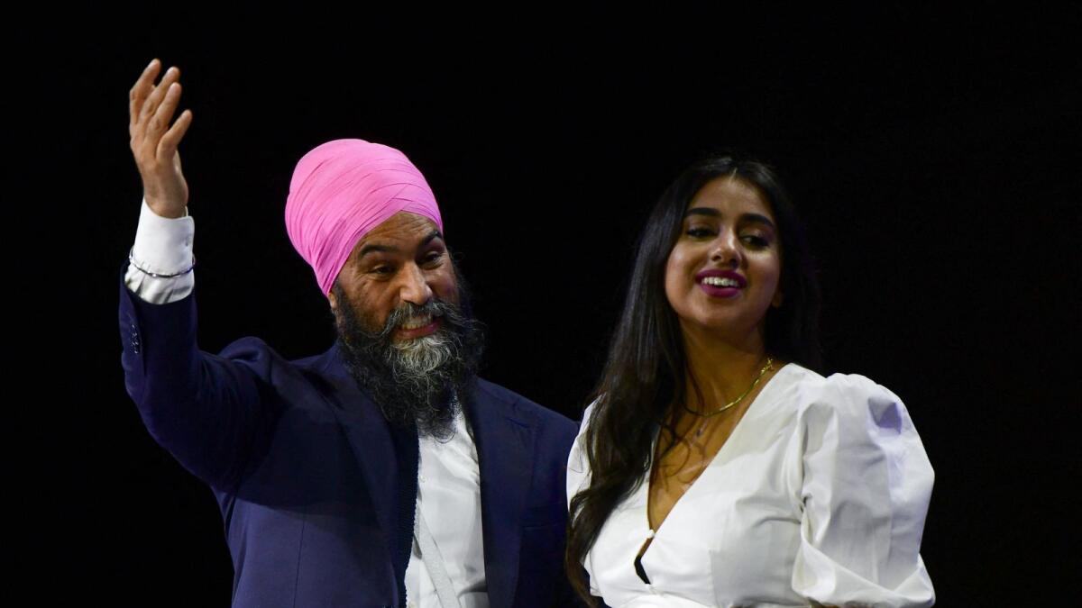 The New Democratic Party (NDP) leader Jagmeet Singh with his wife Gurkiran Kaur Sidhu in Vancouver, Canada. Jagmeet won by nearly 40 per cent vote share. Photo: AFP