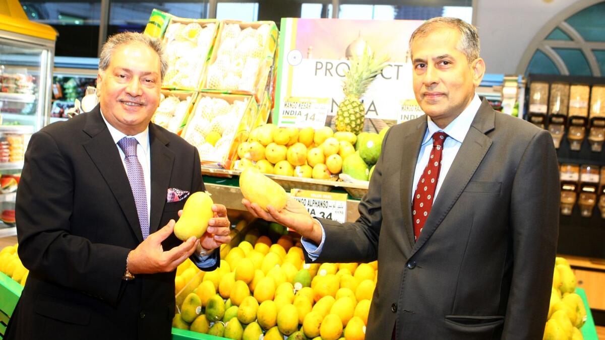 Pavan Kapoor and Kamal Vachani during the former's visit to Al Maya Supermarket in Dubai.