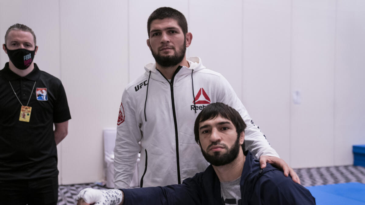 Khabib Nurmagomedov with teammate Zubaira Tukhugov at UFC 253 in Abu Dhabi.  - UFC Twitter