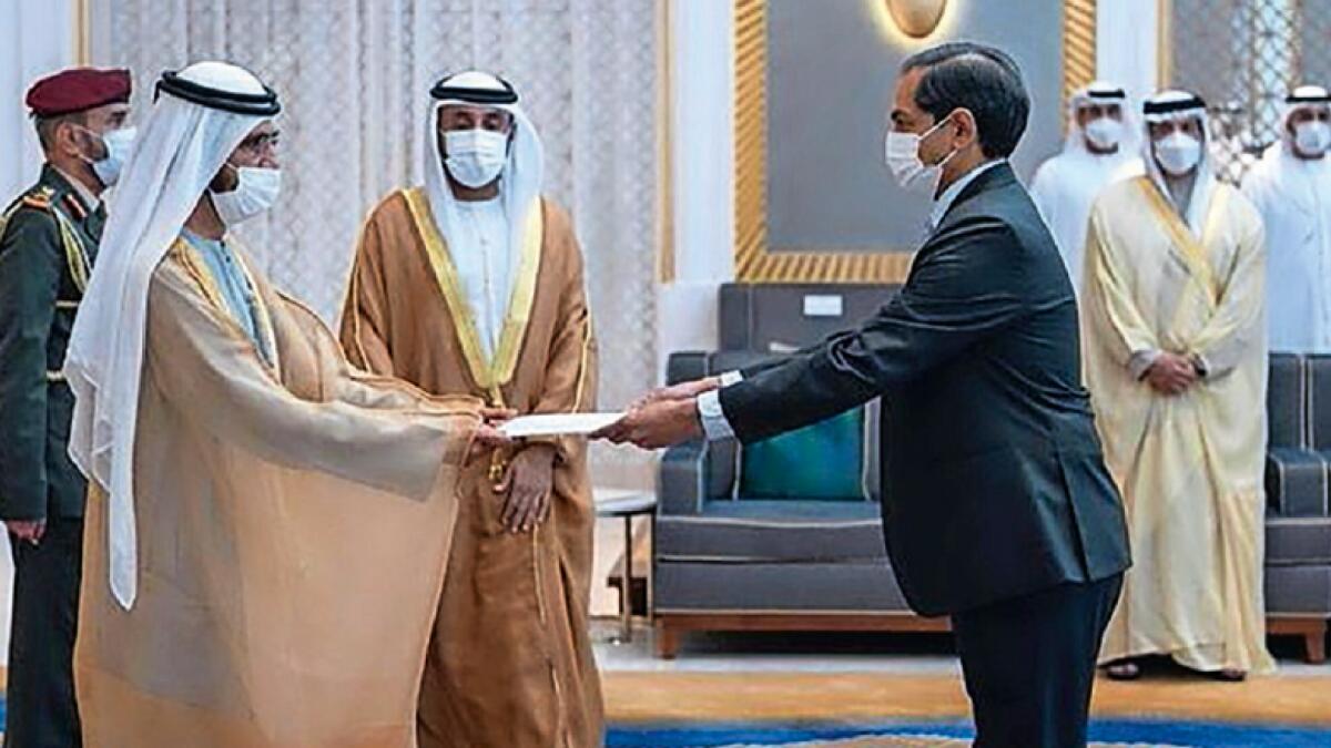 His Highness Sheikh Mohammed bin Rashid Al Maktoum, Vice-President andPrime Minister of the UAE and Ruler of Dubai, with Sunjay Sudhir, IndiaAmbassador to the UAE, who presents his credentials in December 2021.
